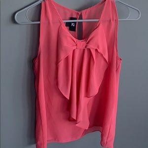 Pink sleeveless blouse with bow